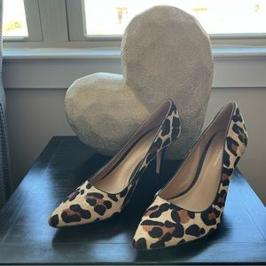Pre-owned BCBGeneration animal print heels.